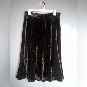 LOFT velvet skirt. There are two small tears on the back of the skirt.
